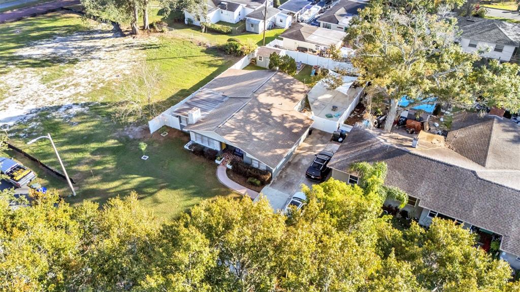 835 Chatfield Street Lakeland, FL 33803 - Photo 51 of 54 an aerial view of a house with a yard swimming pool and outdoor seating