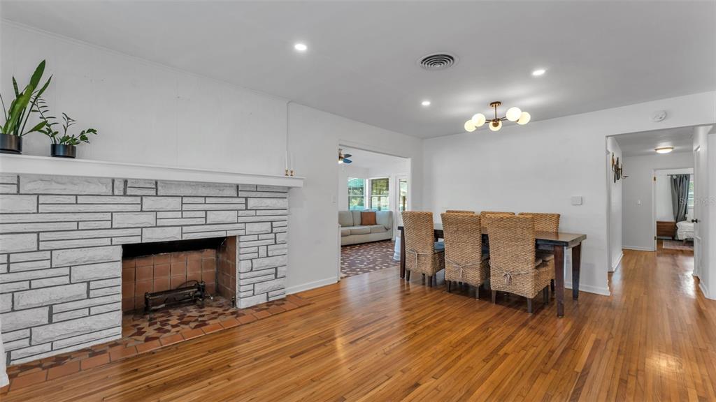 835 Chatfield Street Lakeland, FL 33803 - Photo 6 of 54 a living room with furniture and a fireplace