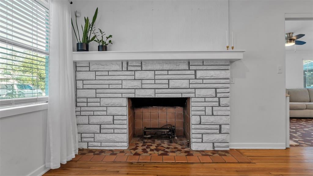 835 Chatfield Street Lakeland, FL 33803 - Photo 7 of 54 a living room with a fireplace