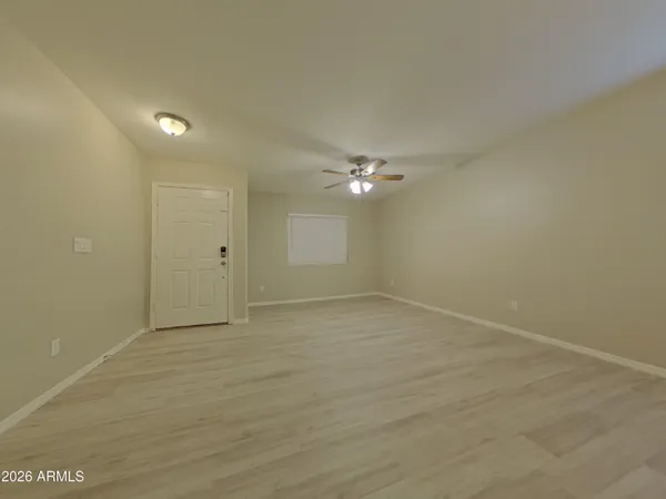 a picture of a cabinet with a white wall