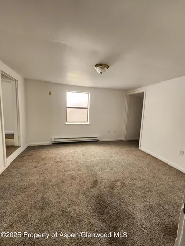 a view of room with gym equipment