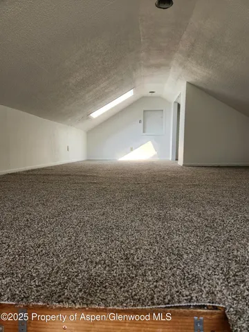 a view of a backyard of the house