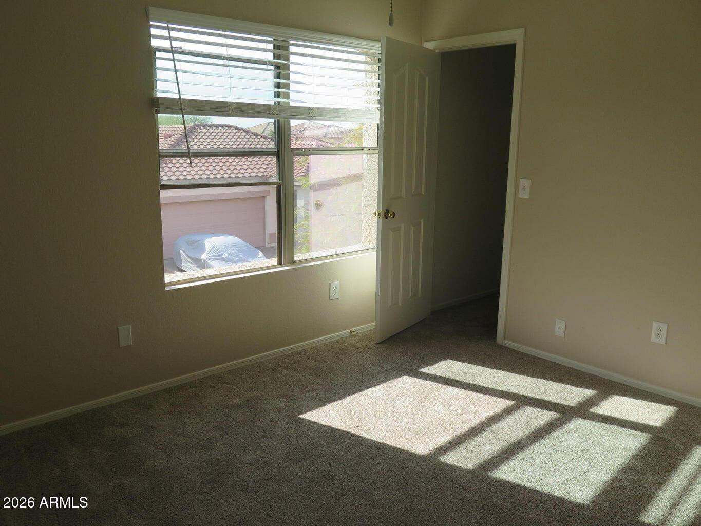 3331 South Chaparral Road Apache Junction, AZ 85119 - Photo 15 of 24 an empty room with windows