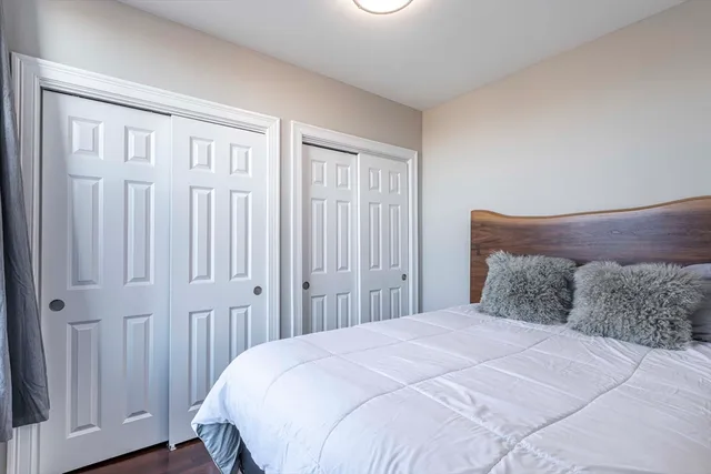 a bathroom with a sink vanity tub and a mirror