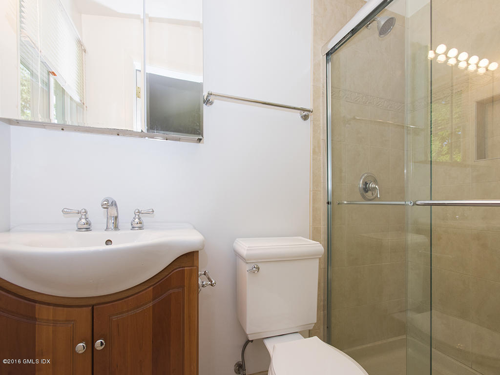 6 Crawford Terrace Riverside, CT 06878 - Photo 16 of 29 a bathroom with a sink toilet and shower