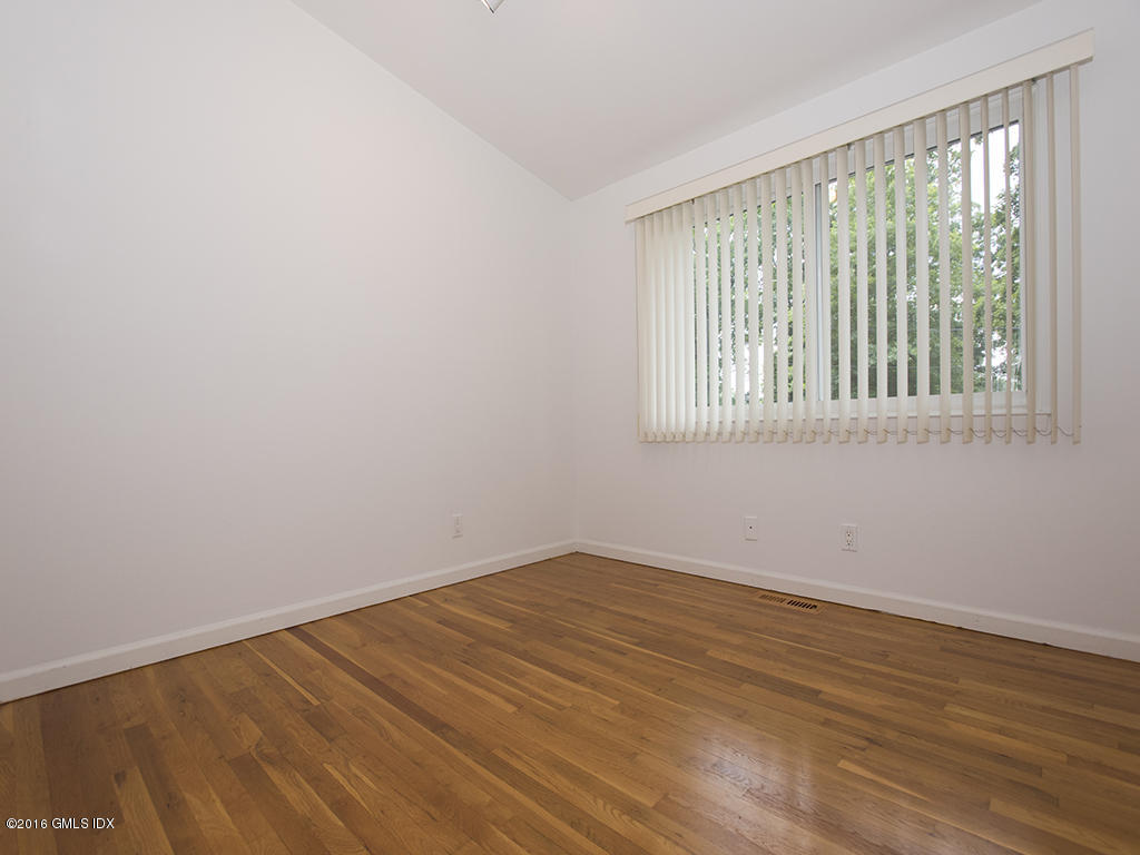 6 Crawford Terrace Riverside, CT 06878 - Photo 18 of 29 wooden floor in an empty room with a window