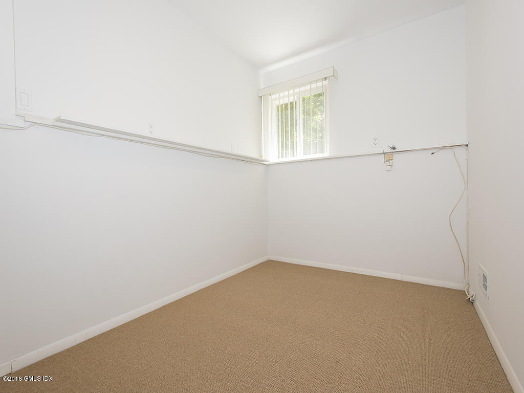 6 Crawford Terrace Riverside, CT 06878 - Photo 21 of 29 a view of small space with racks on the wall