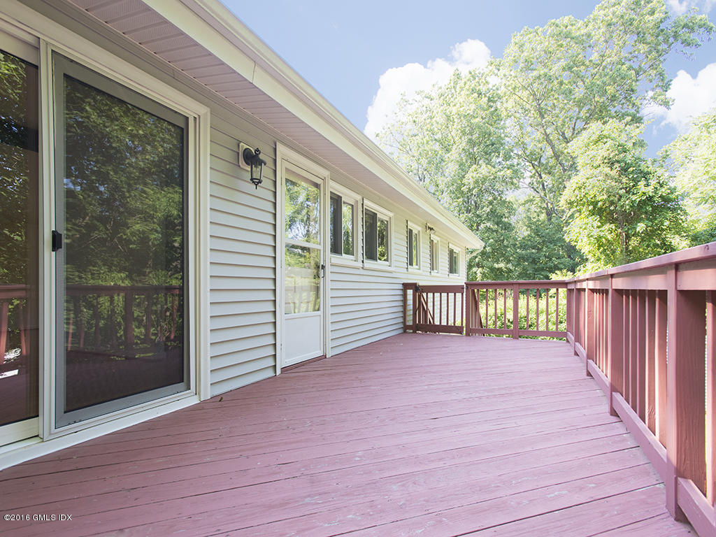 6 Crawford Terrace Riverside, CT 06878 - Photo 27 of 29 a view of backyard with deck and wooden floor