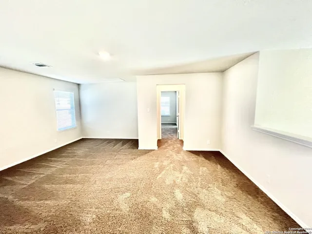 an empty room with a natural light