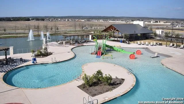 a view of a swimming pool with a outdoor space