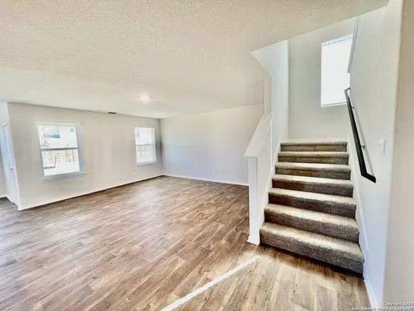 a view of entryway with wooden floor
