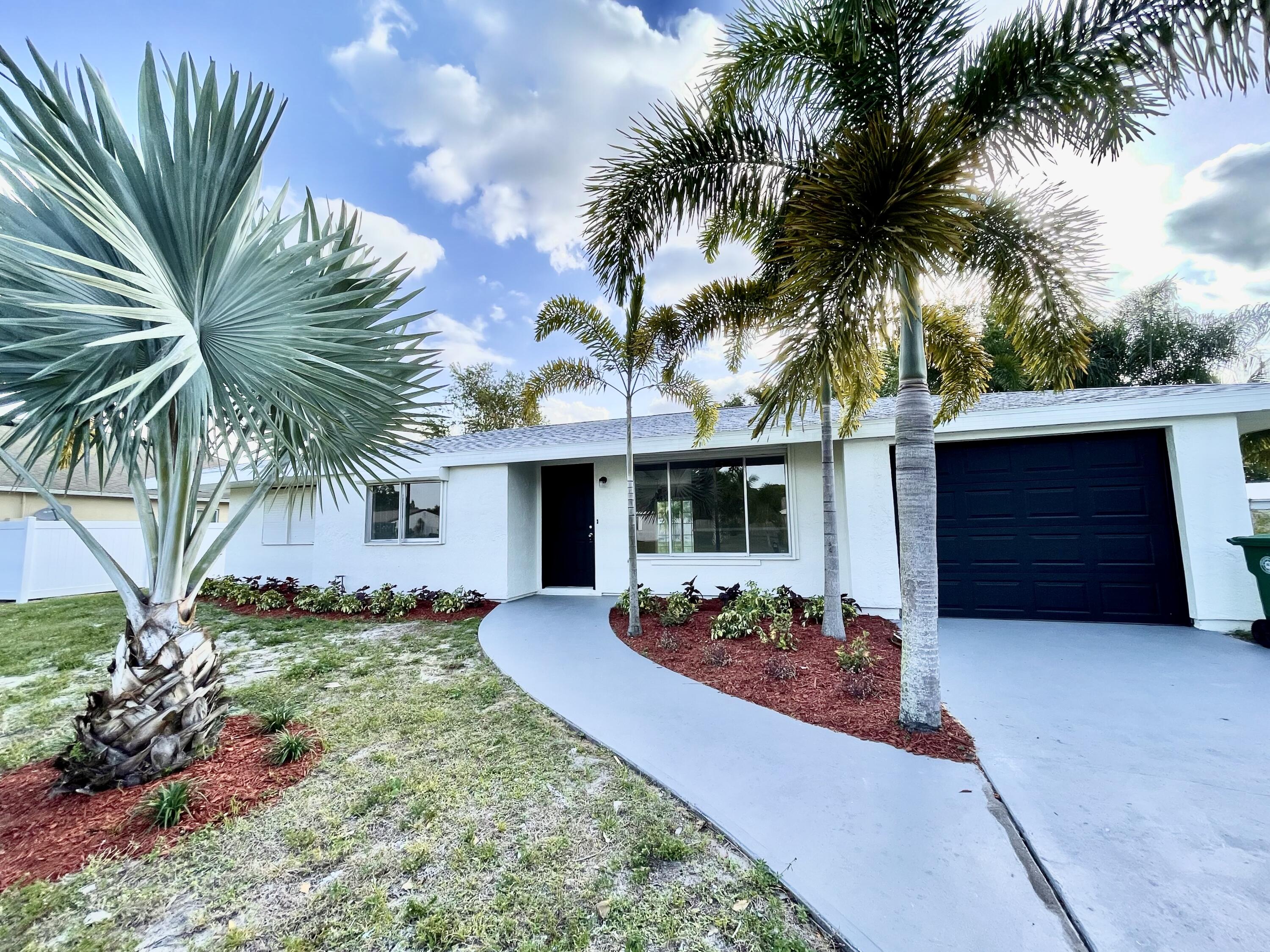 225 Southwest Homeland Road Port St. Lucie, FL 34953 - Photo 2 of 19 IMG_5415