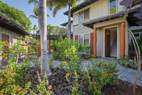 a view of a house with small garden