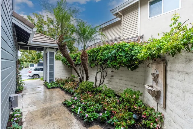 a bathroom with a granite countertop sink double vanity and a mirror