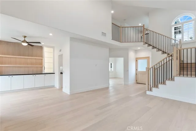 a bathroom with double vanity sinks and a mirror
