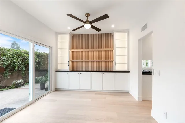 a bathroom with a double vanity sink mirror double and shower