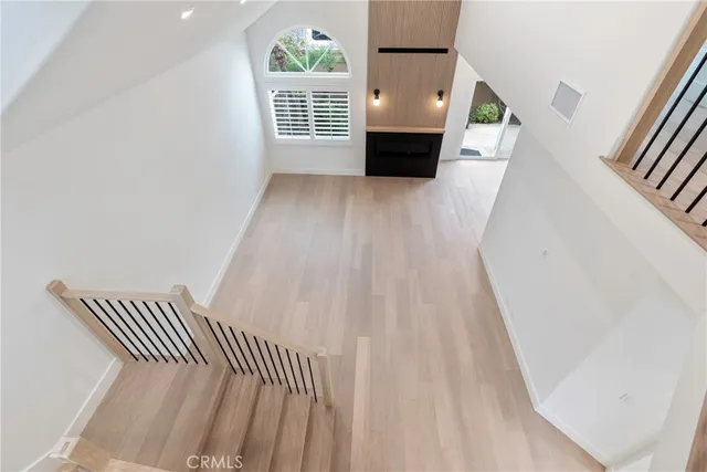 a view of a hallway with stairs