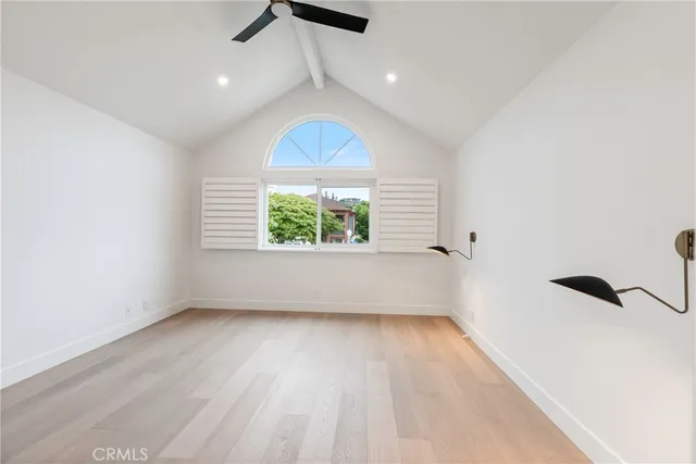 a bathroom with a sink and a mirror with bathtub