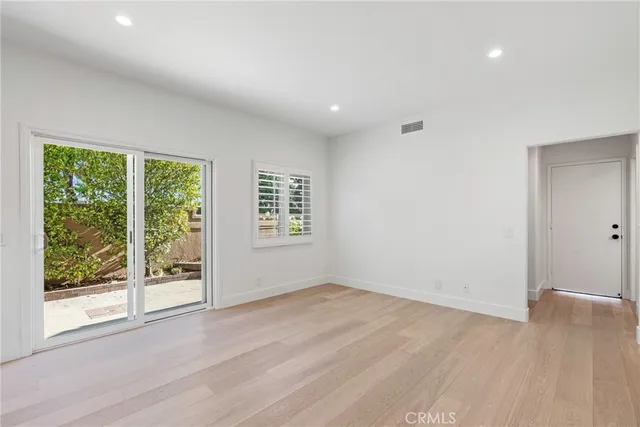 a kitchen with granite countertop a stove and a sink