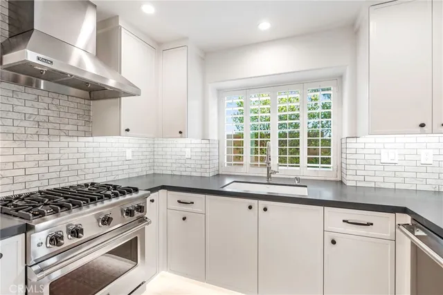 a view of kitchen with wooden floor
