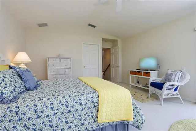 a bedroom with a bed and furniture