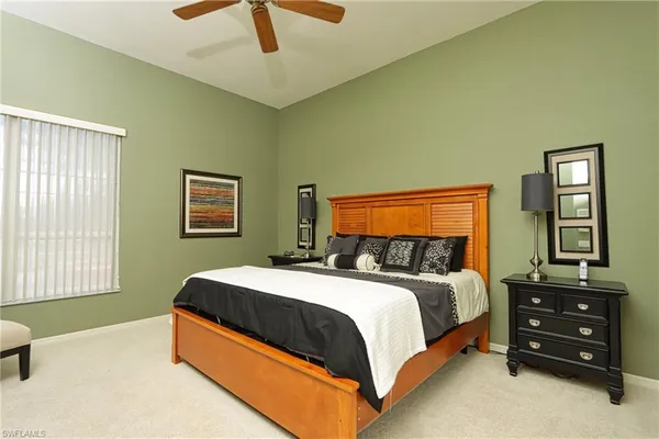 a bedroom with a bed and a closet