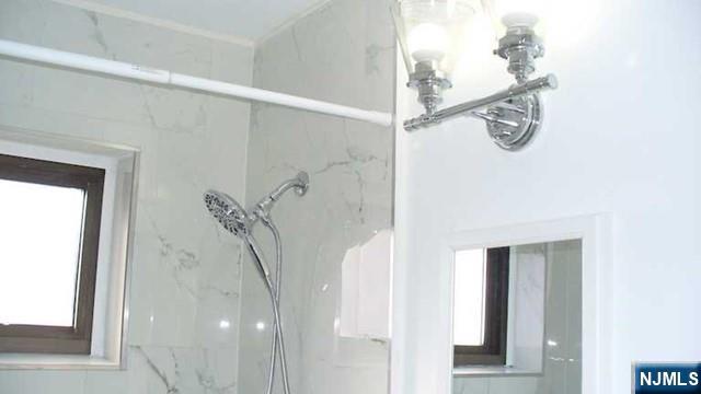 501 Linwood Drive, Unit 5J Fort Lee, NJ 07024 - Photo 15 of 23 a bathroom with a shower