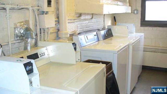 501 Linwood Drive, Unit 5J Fort Lee, NJ 07024 - Photo 17 of 23 a utility room with dryer and washer