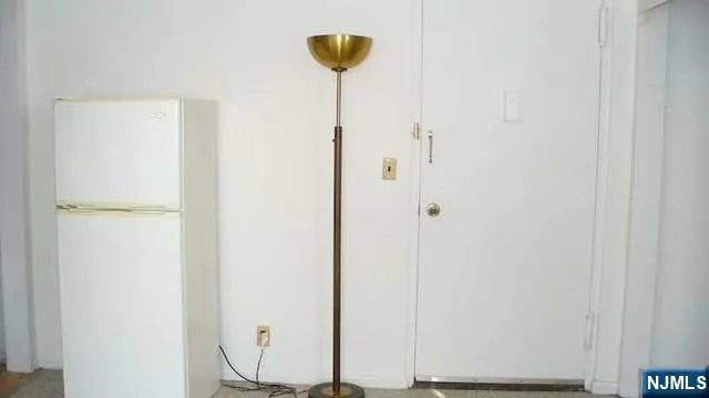 a view of a elevator with wooden door