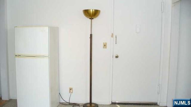 501 Linwood Drive, Unit 5J Fort Lee, NJ 07024 - Photo 5 of 23 a view of a elevator with wooden door