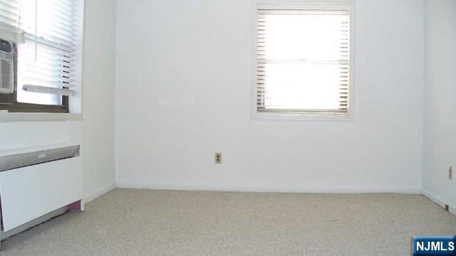 501 Linwood Drive, Unit 5J Fort Lee, NJ 07024 - Photo 7 of 23 a view of an empty room and a window