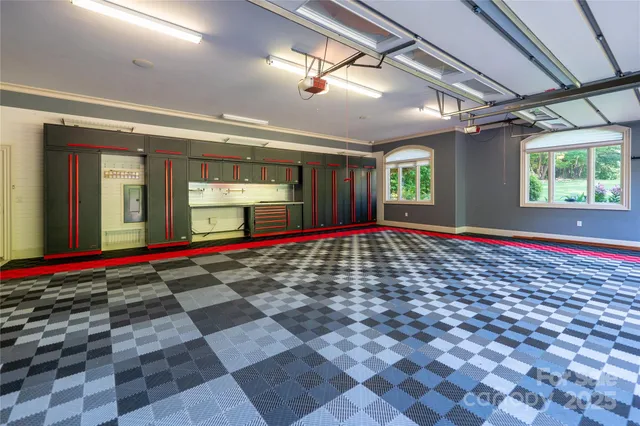 a view of a room with window and a ceiling fan