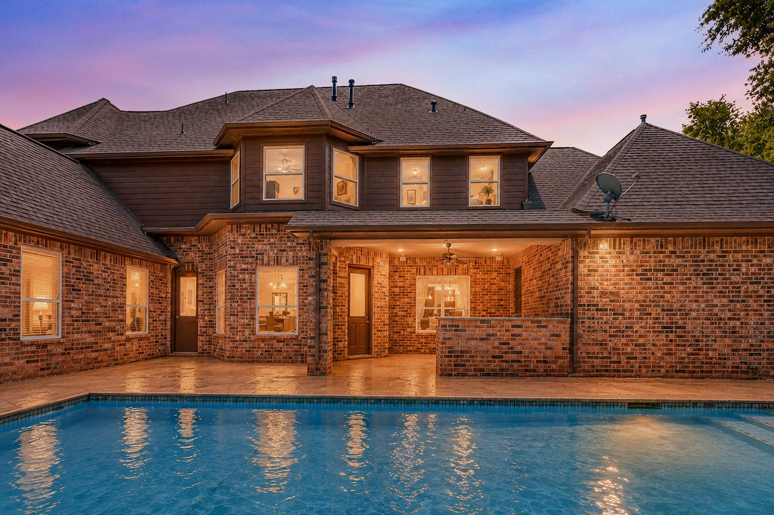 5327 Whitmore Fulshear, TX 77441 - Photo 4 of 50 Your own private backyard retreat awaits, featuring a sparkling pool and spa, full outdoor kitchen, expansive outdoor living spaces, and abundant room for entertaining, relaxing, and enjoying the outdoors year-round