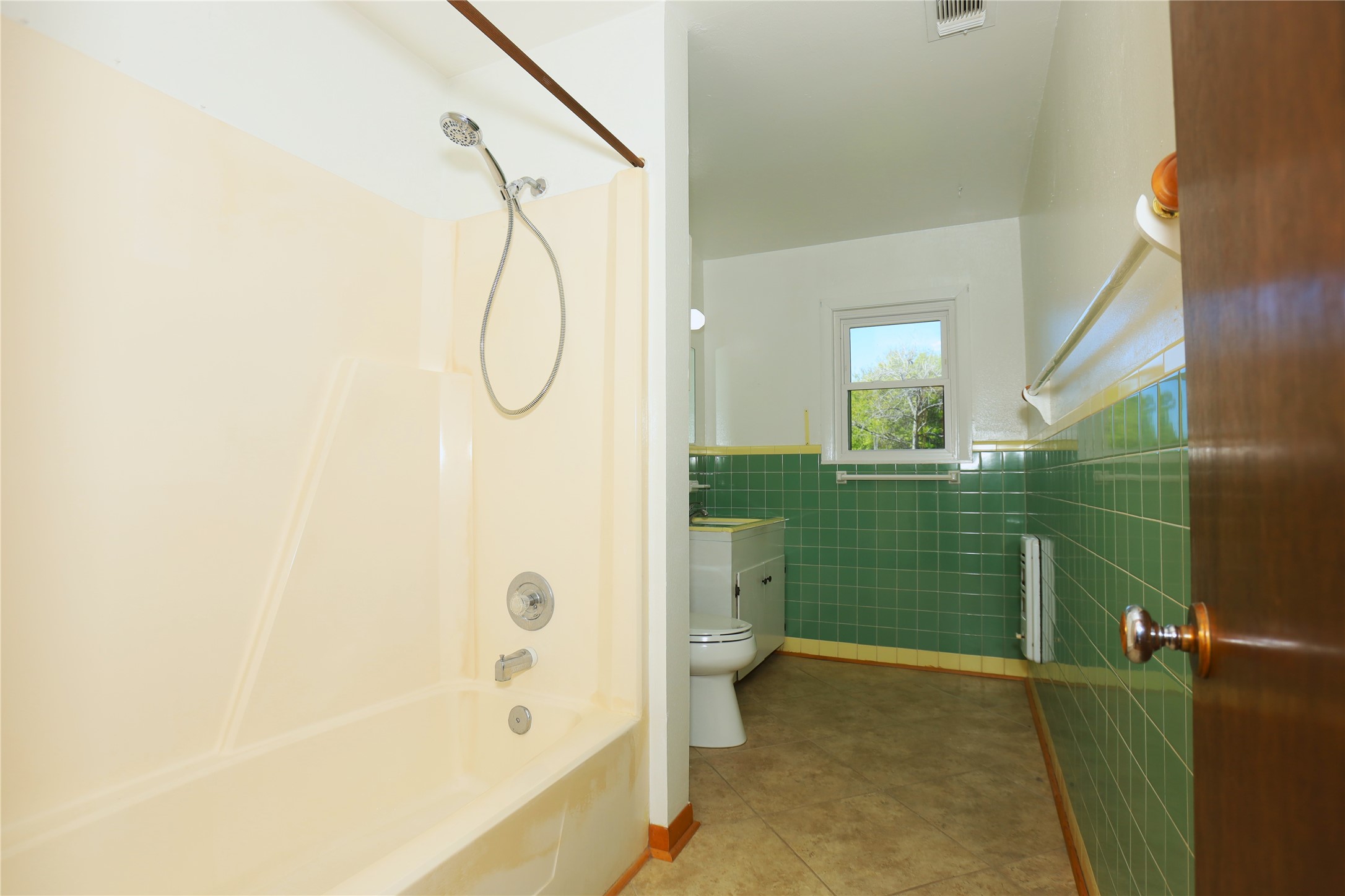 700 Wesley Drive Clute, TX 77531 - Photo 17 of 27 a bathroom with a shower and a sink
