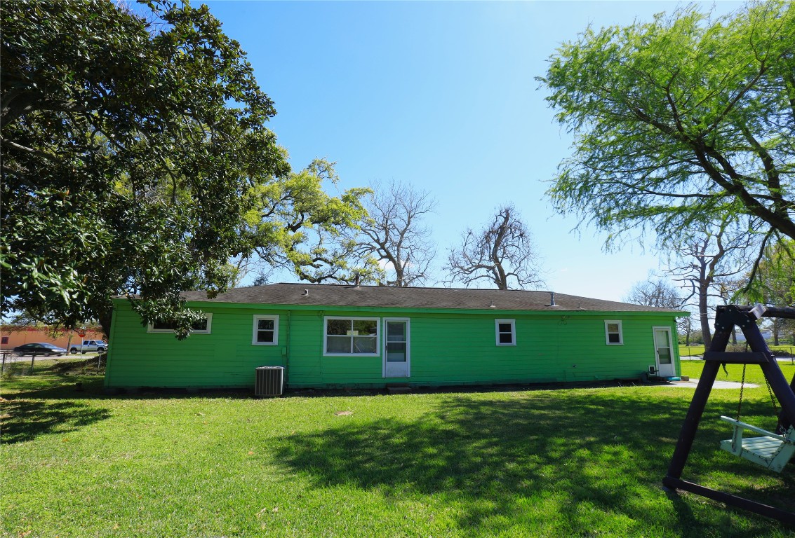 700 Wesley Drive Clute, TX 77531 - Photo 26 of 27 a view of a house with a backyard