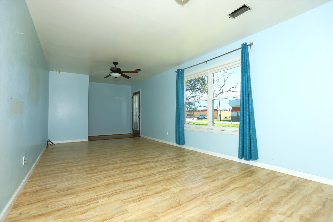 700 Wesley Drive Clute, TX 77531 - Photo 3 of 27 a view of an empty room with a window