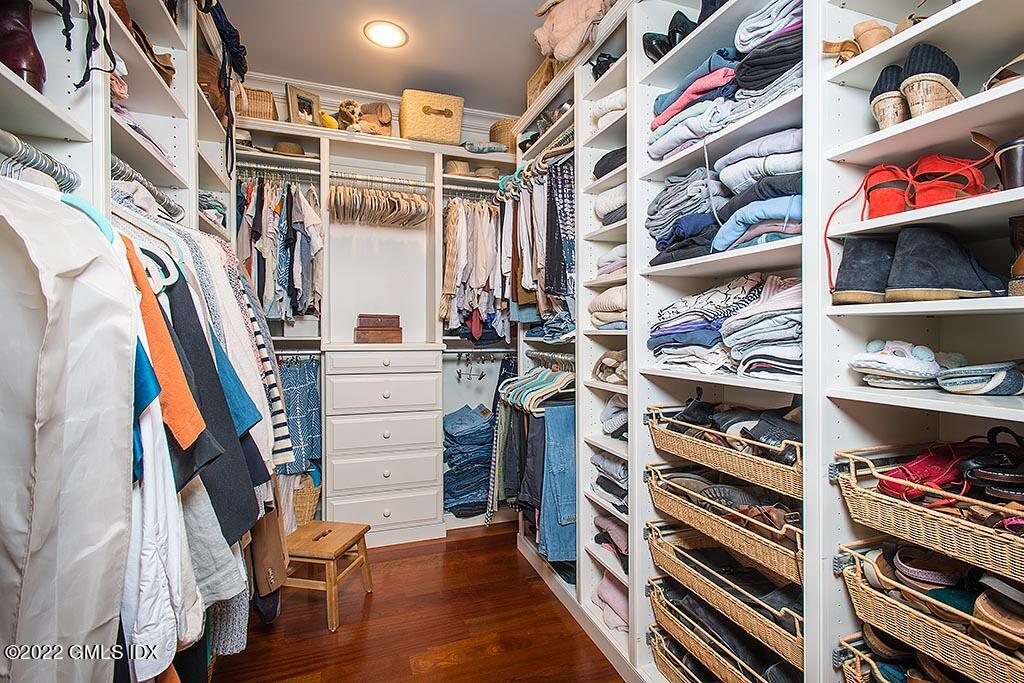 26 Hendrie Avenue Riverside, CT 06878 - Photo 14 of 37 a view of walk in closet with clothes and shoes