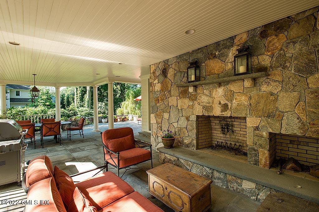 26 Hendrie Avenue Riverside, CT 06878 - Photo 24 of 37 a outdoor living space with patio furniture and garden view