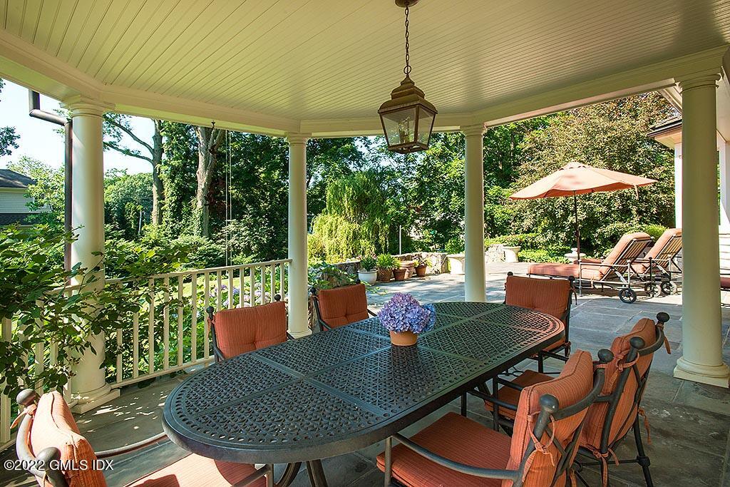 26 Hendrie Avenue Riverside, CT 06878 - Photo 26 of 37 a outdoor dining space with furniture and outdoor view