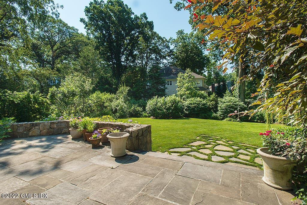 26 Hendrie Avenue Riverside, CT 06878 - Photo 31 of 37 a view of a patio with garden and furniture