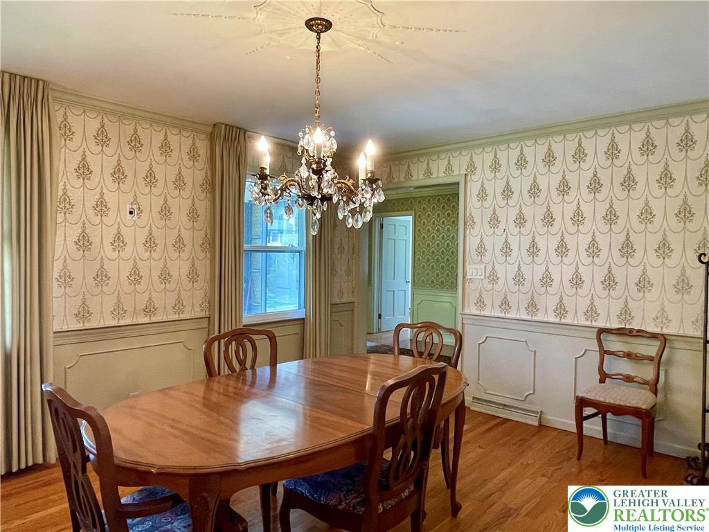 1331 Armstrong Road Bethlehem, PA 18017 - Photo 13 of 47 a view of a dining room with furniture window and wooden floor