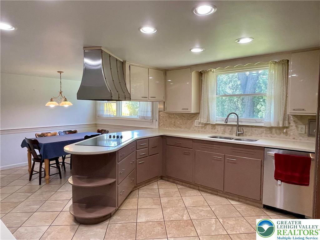 1331 Armstrong Road Bethlehem, PA 18017 - Photo 15 of 47 a kitchen with kitchen island a sink and a stove