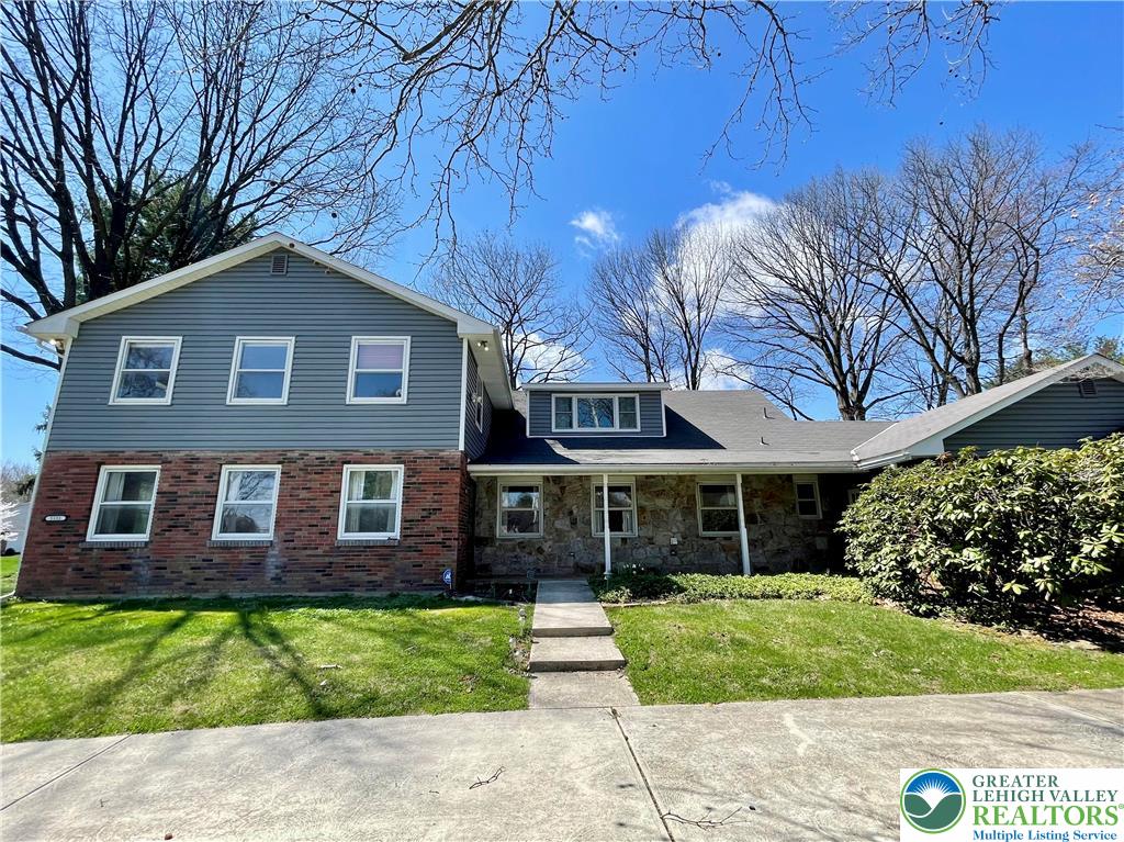 1331 Armstrong Road Bethlehem, PA 18017 - Photo 2 of 47 a front view of a house with a yard