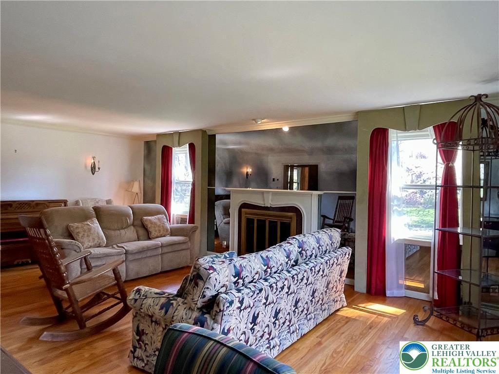 1331 Armstrong Road Bethlehem, PA 18017 - Photo 22 of 47 a living room with furniture fireplace and flat screen tv