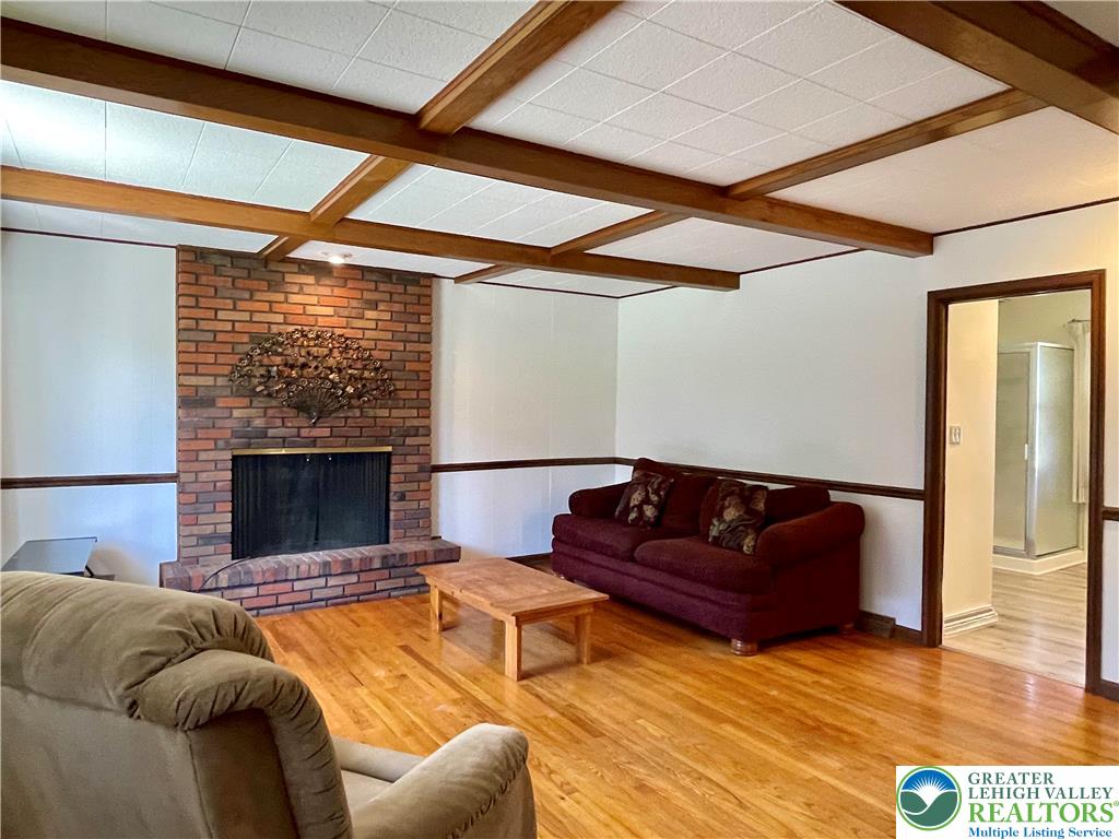 1331 Armstrong Road Bethlehem, PA 18017 - Photo 25 of 47 a living room with furniture and a fireplace