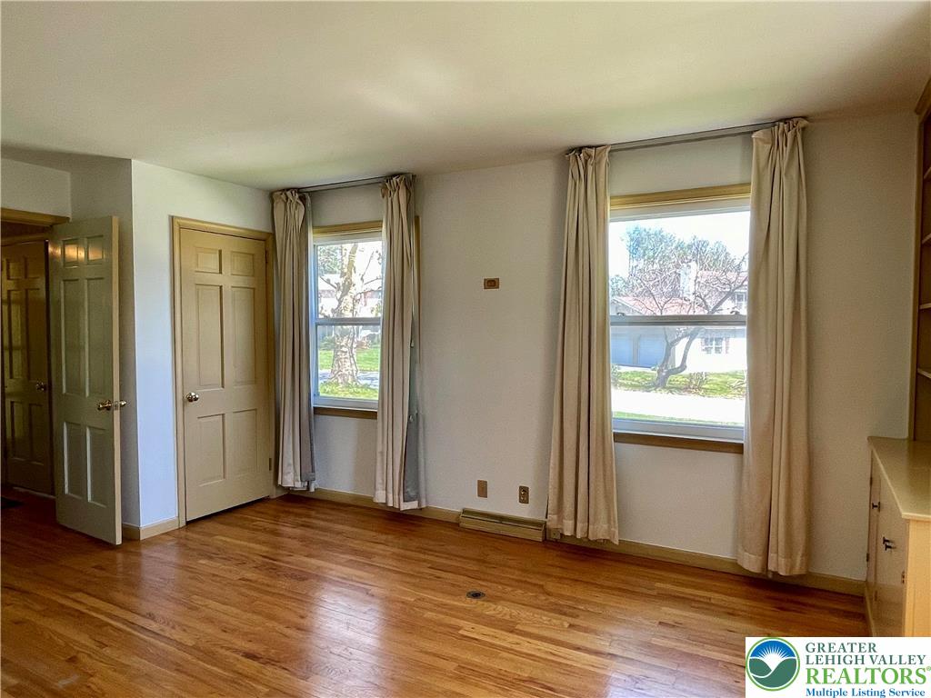 1331 Armstrong Road Bethlehem, PA 18017 - Photo 27 of 47 an empty room with wooden floor and windows