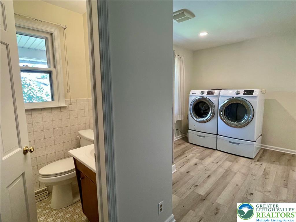 1331 Armstrong Road Bethlehem, PA 18017 - Photo 29 of 47 a white toilet sitting next to a bathroom sink