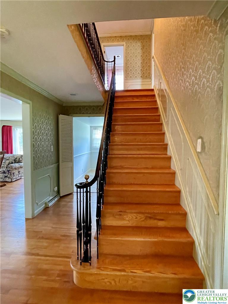 1331 Armstrong Road Bethlehem, PA 18017 - Photo 31 of 47 a view of entryway and hall with wooden floor