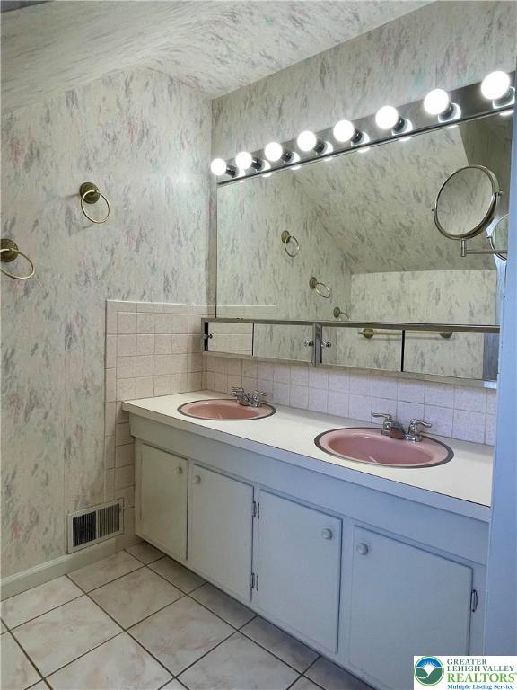 1331 Armstrong Road Bethlehem, PA 18017 - Photo 36 of 47 a bathroom with a sink and a mirror