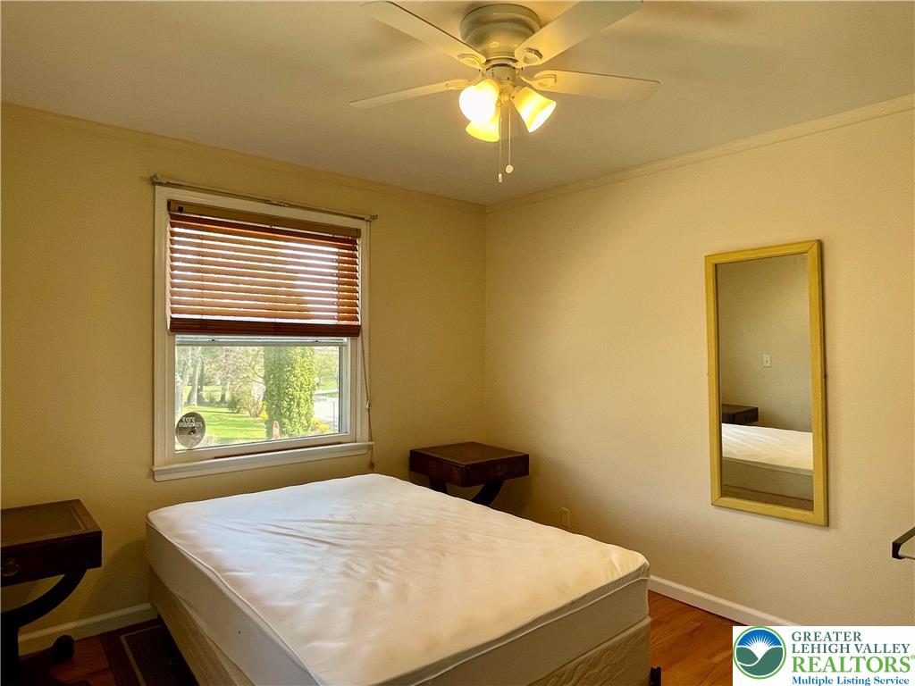1331 Armstrong Road Bethlehem, PA 18017 - Photo 40 of 47 a bedroom with a bed and a window